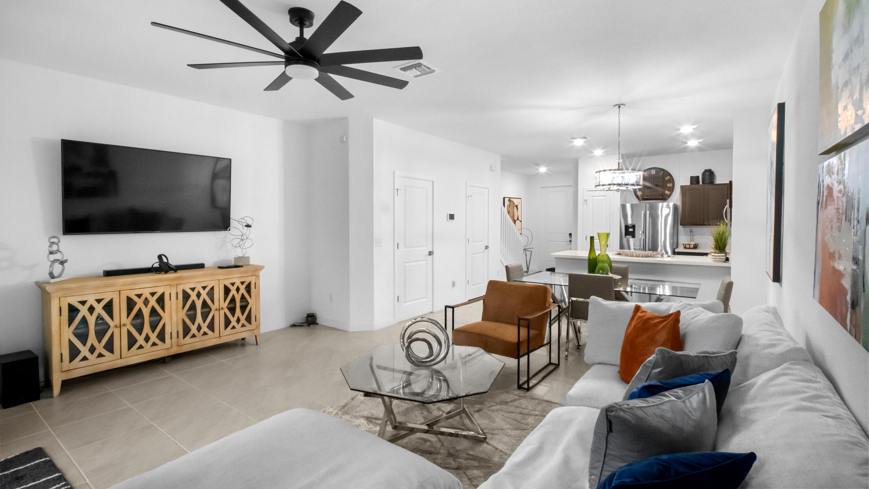 185 Bandol Street Riviera Beach, FL 33404 - Photo 7 of 28 a living room with furniture and a flat screen tv