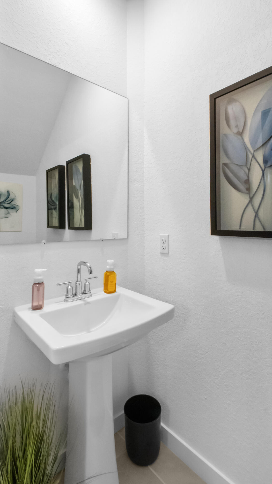 185 Bandol Street Riviera Beach, FL 33404 - Photo 9 of 28 a bathroom with a sink and a mirror