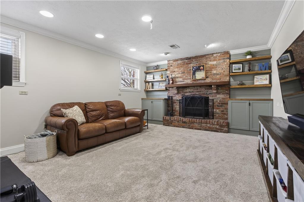 909 Bebout Road Venetia, PA 15367 - Photo 24 of 42 Lower level with fireplace!