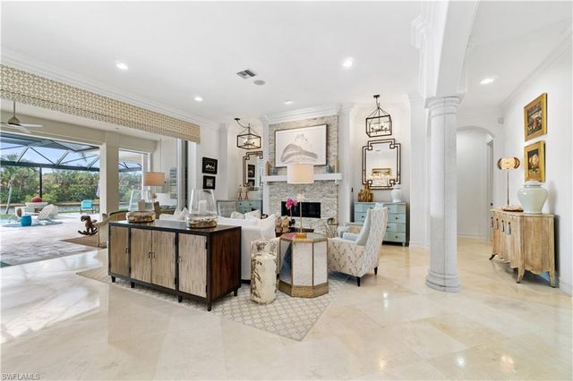 a view of a kitchen with furniture and a kitchen