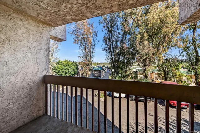 a view of a street from a balcony
