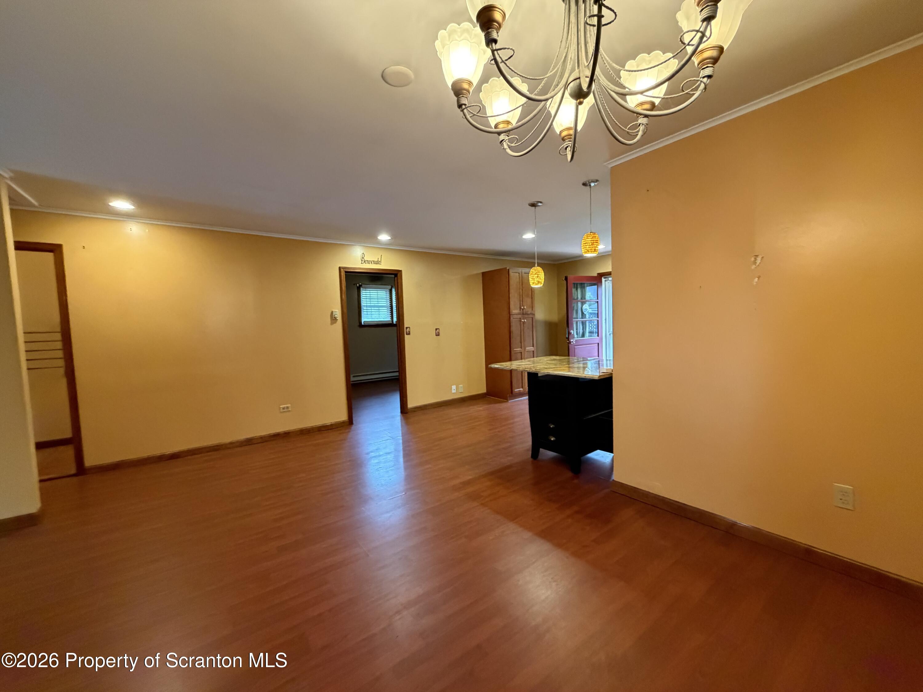1019 Moosic Street Scranton, PA 18505 - Photo 20 of 43 a view of a livingroom with a kitchen