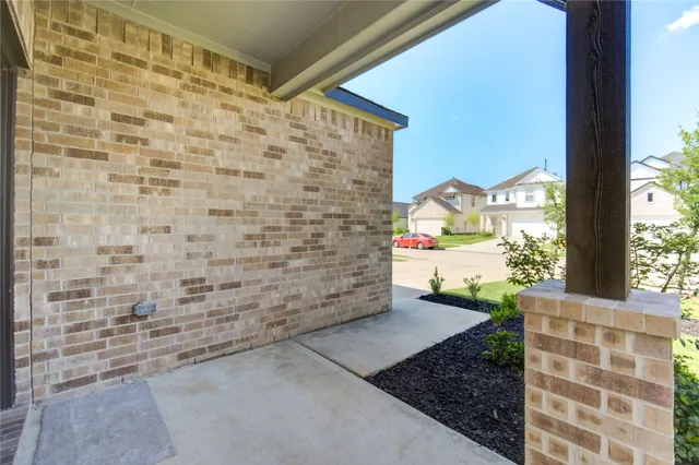 a view of empty room with windows