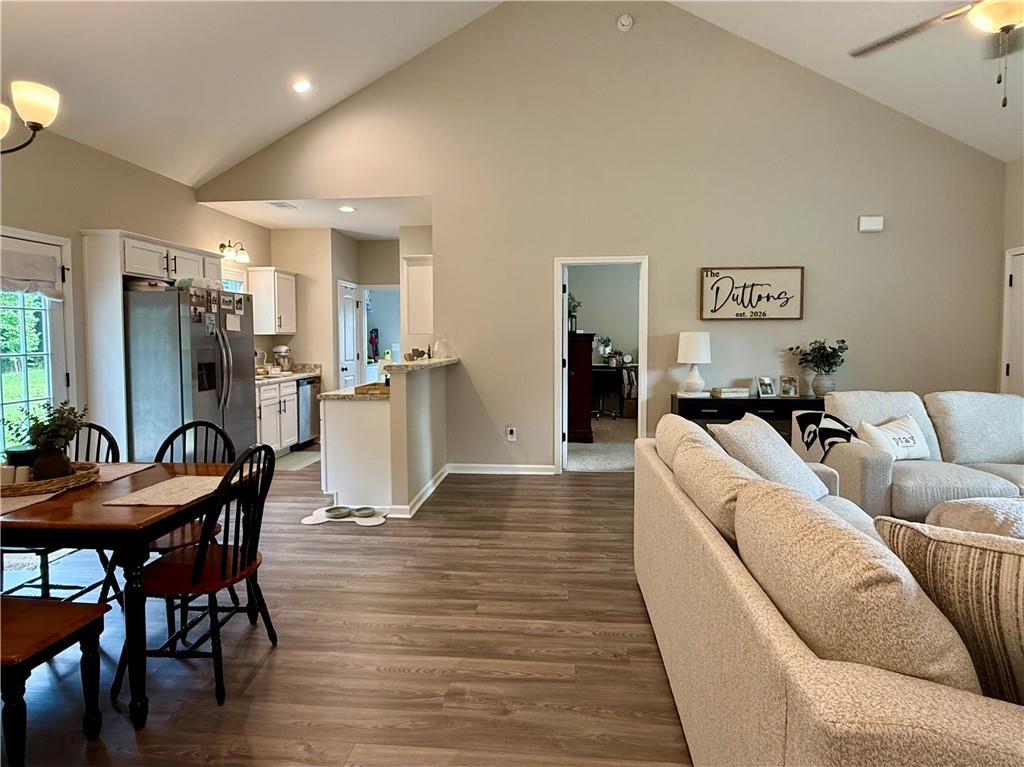 1776 Pleasant Grove Road Temple, GA 30179 - Photo 22 of 45 a living room with furniture and a wooden floor