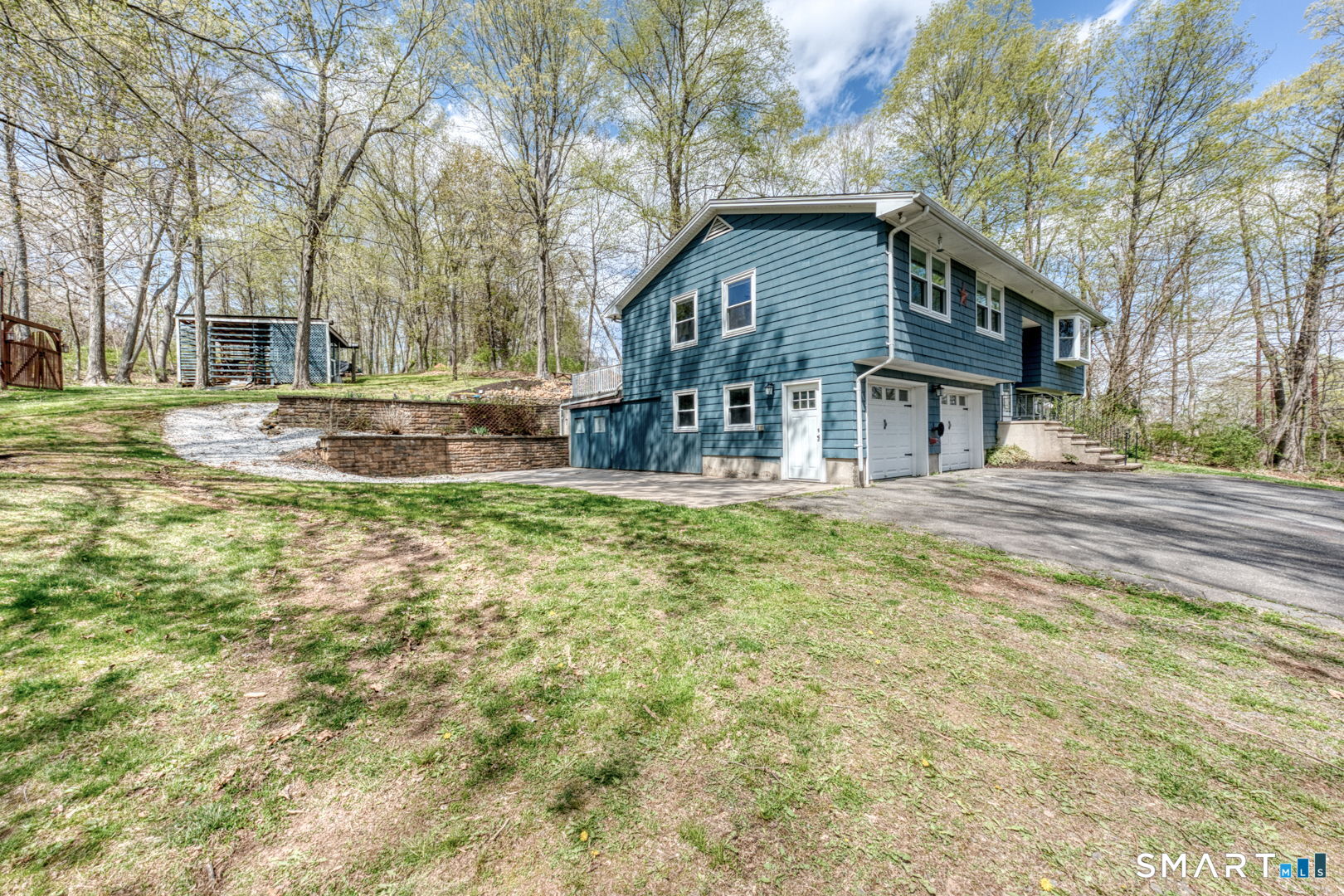 341 Main Street Middlefield, CT 06481 - Photo 2 of 30 a view of a house with a yard and sitting area