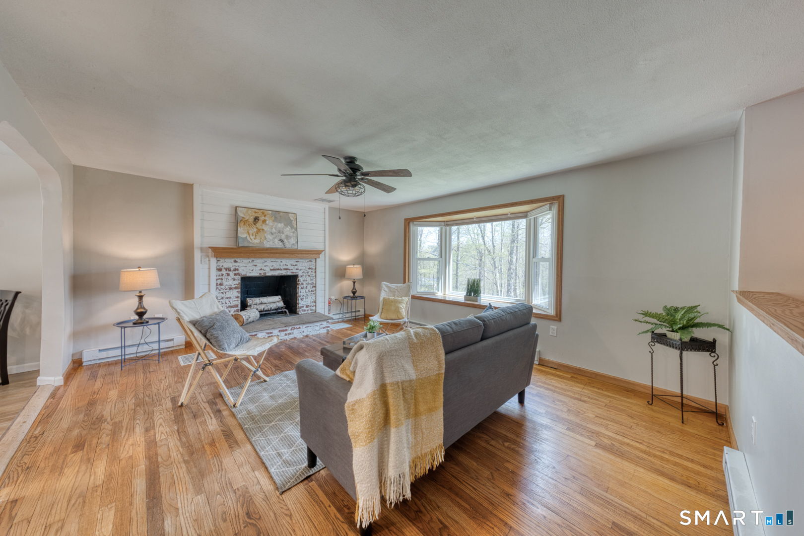 341 Main Street Middlefield, CT 06481 - Photo 5 of 30 a living room with furniture and a fireplace