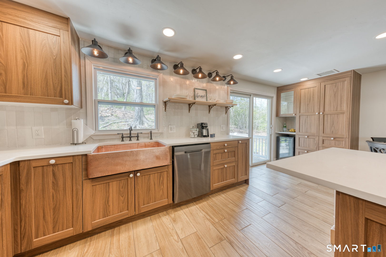 341 Main Street Middlefield, CT 06481 - Photo 9 of 30 a kitchen with kitchen island granite countertop a sink cabinets and stainless steel appliances