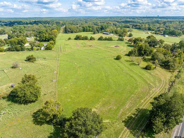 a view of lake with green space