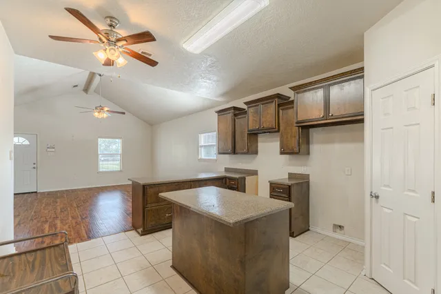 a view of a bathroom with a glass door