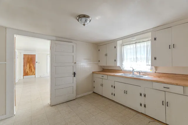 an empty room with windows