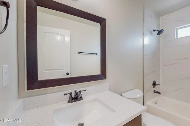 a bathroom with a sink and a bathtub