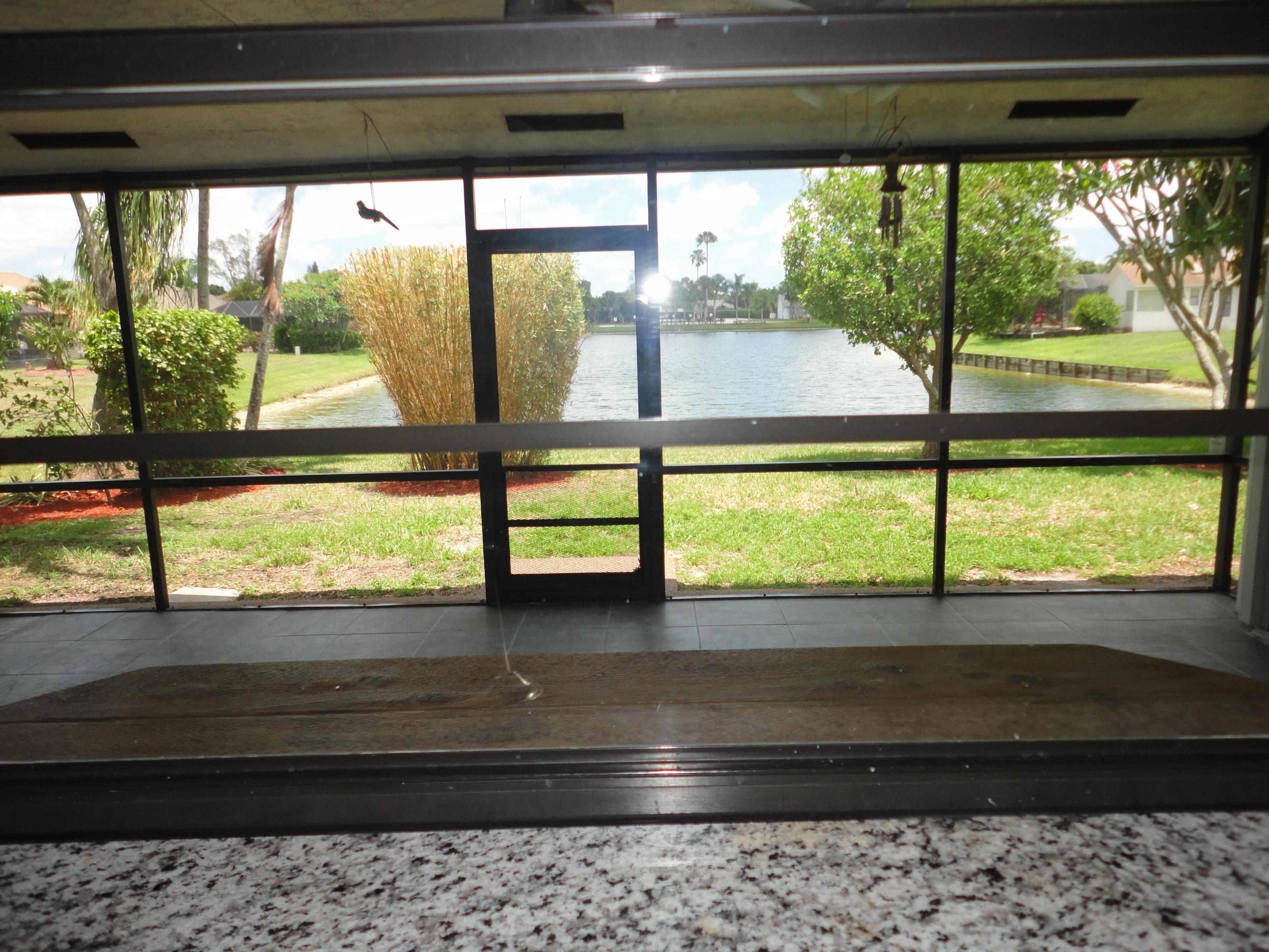 9793 Majorca Place Boca Raton, FL 33434 - Photo 5 of 41 View - Kitchen Pass Thru