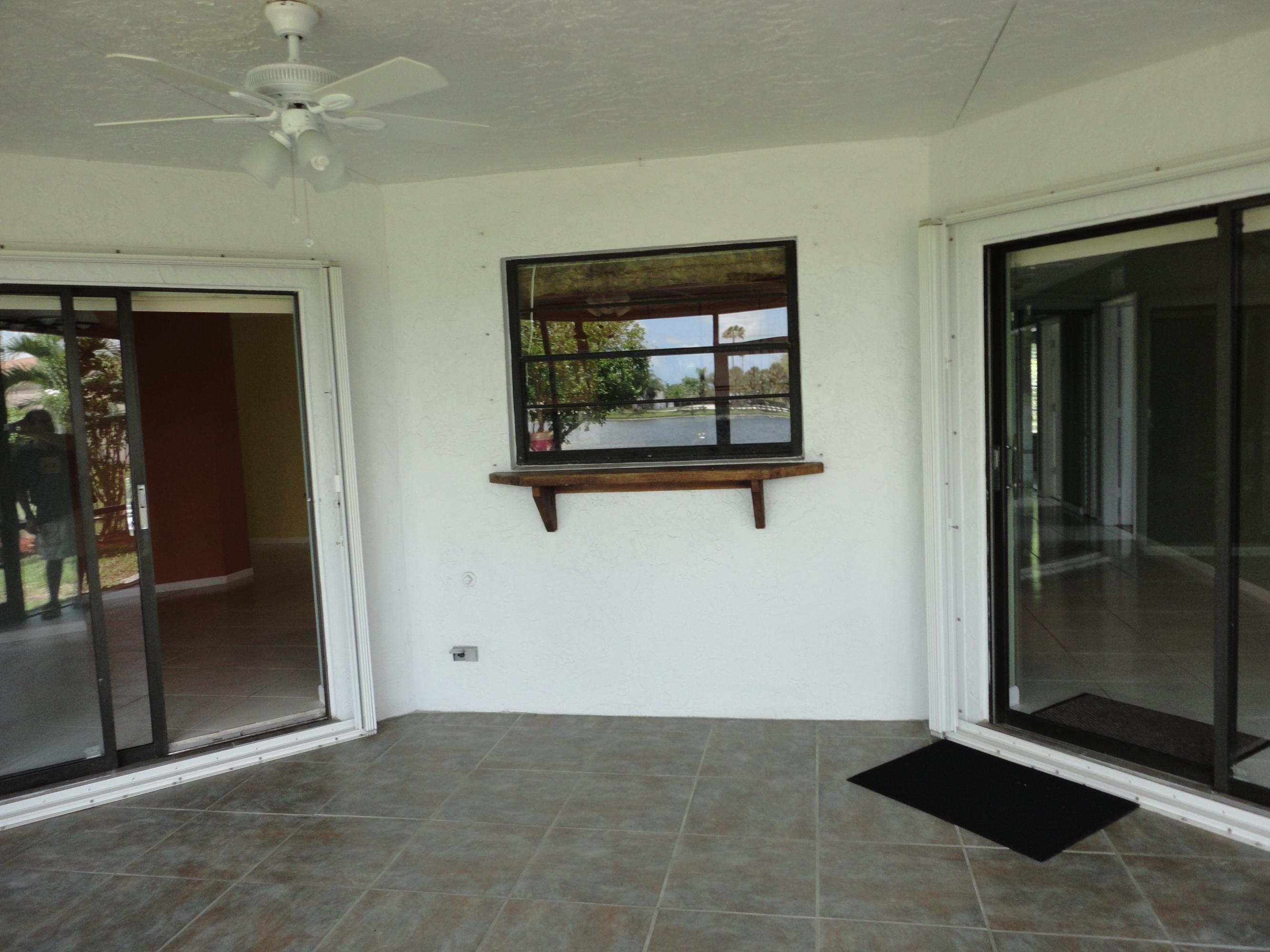 9793 Majorca Place Boca Raton, FL 33434 - Photo 8 of 41 Patio W/Kitchen Pass Thru
