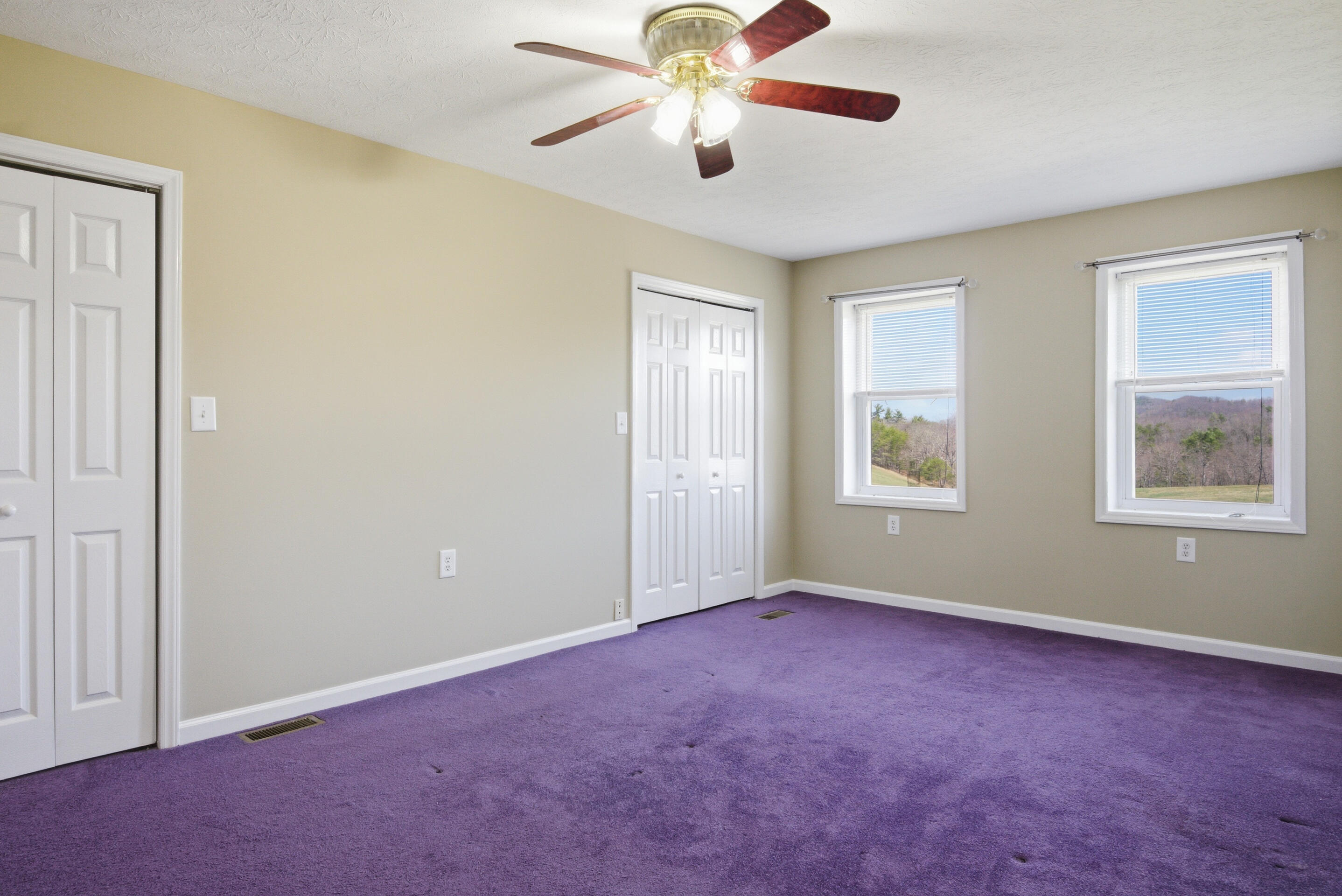 6458 Piney Woods Road Riner, VA 24149 - Photo 28 of 50 a view of an empty room with a window