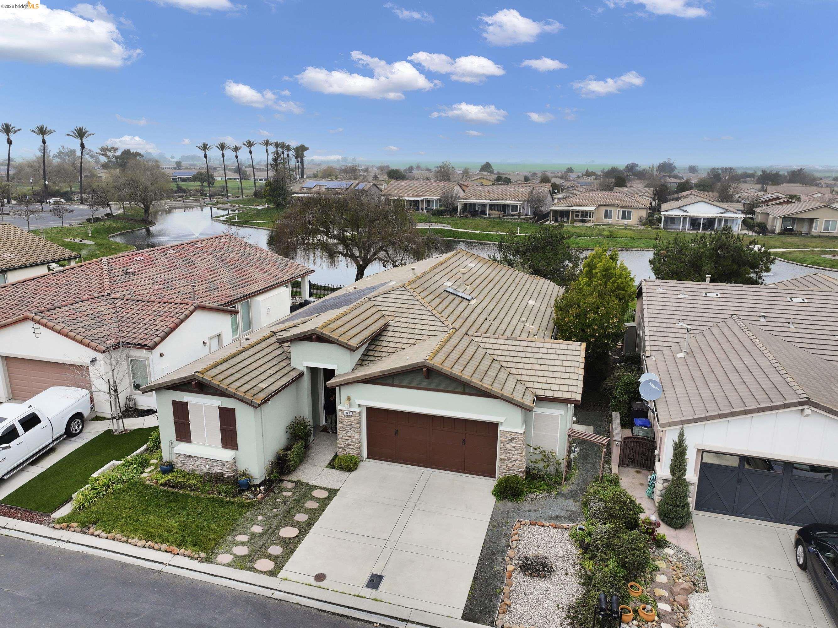 342 Desert Forest Court Rio Vista, CA 94571 - Photo 5 of 40 Aerial perspective of suburban area with a large body of water