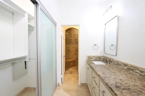 a view of a bathroom with wooden floor