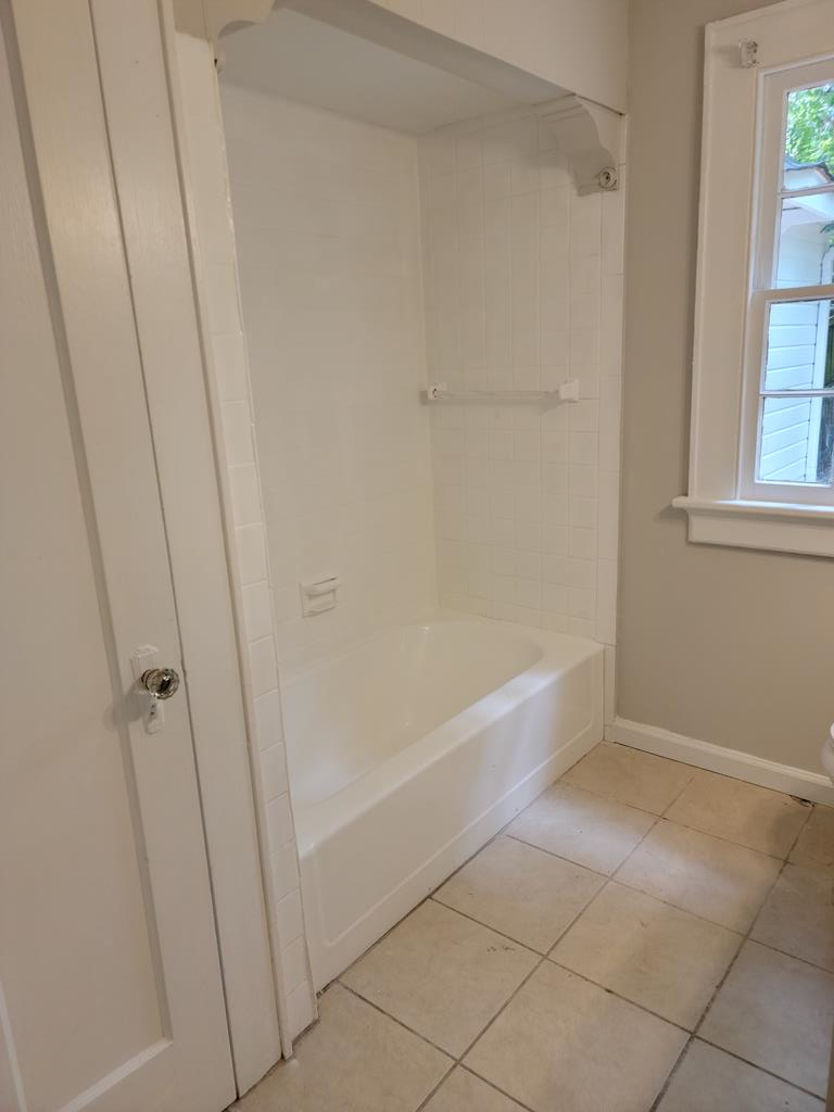 3643 Forrest Road Columbus, GA 31907 - Photo 5 of 12 a bathroom with a bathtub