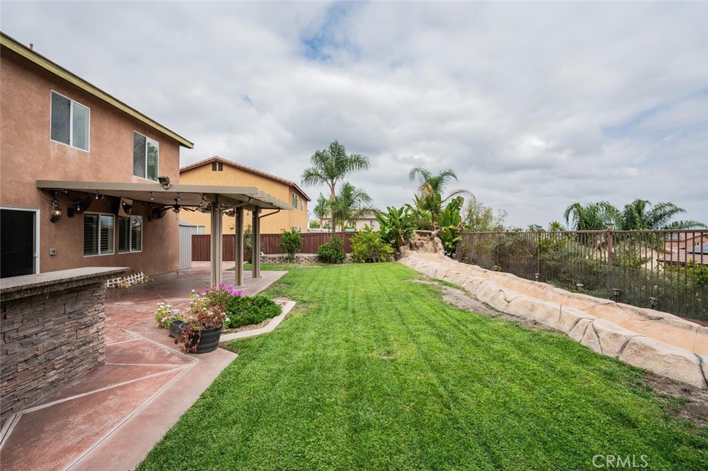 17262 Hawkwood Drive Riverside, CA 92503 - Photo 27 of 33 a front view of a house with garden
