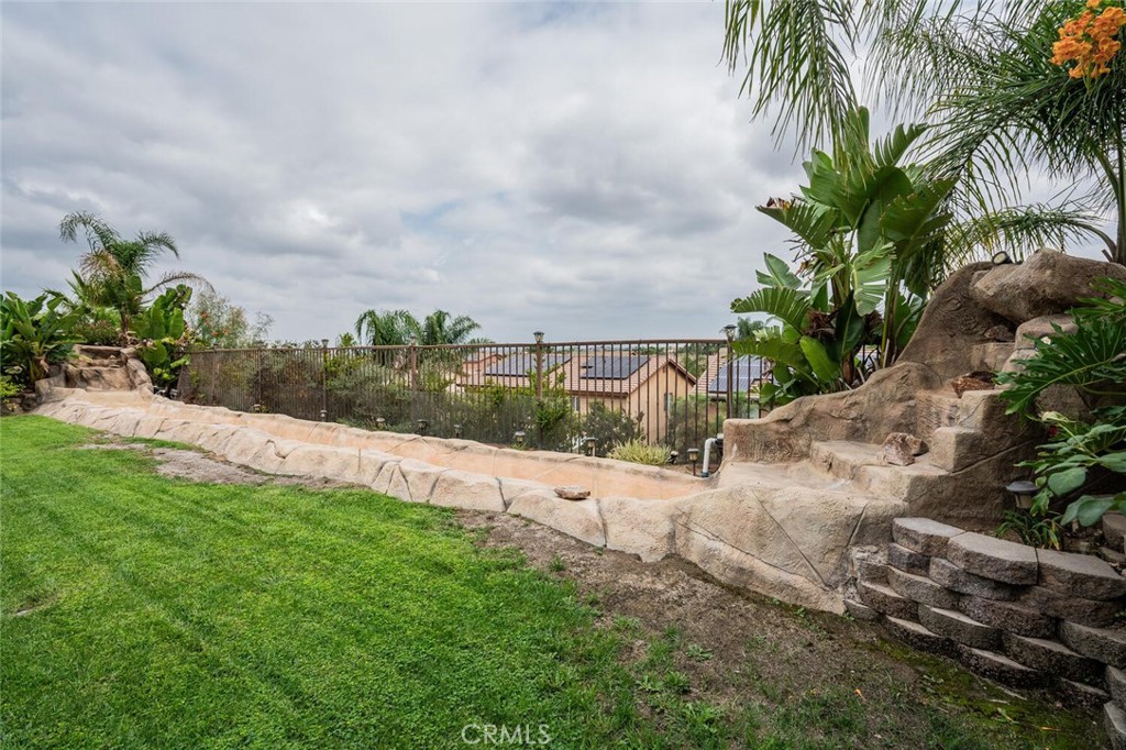17262 Hawkwood Drive Riverside, CA 92503 - Photo 29 of 33 a view of a yard with palm trees