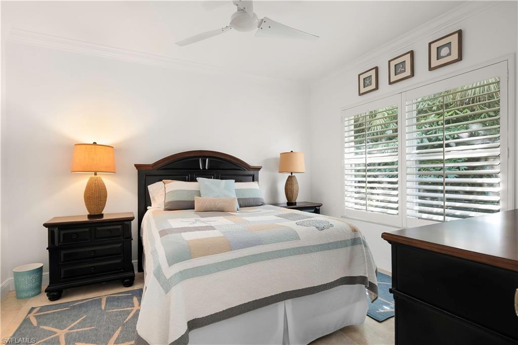 326 Bradstrom Circle, Unit 203F Naples, FL 34113 - Photo 8 of 17 Master Bedroom with walk in Closet