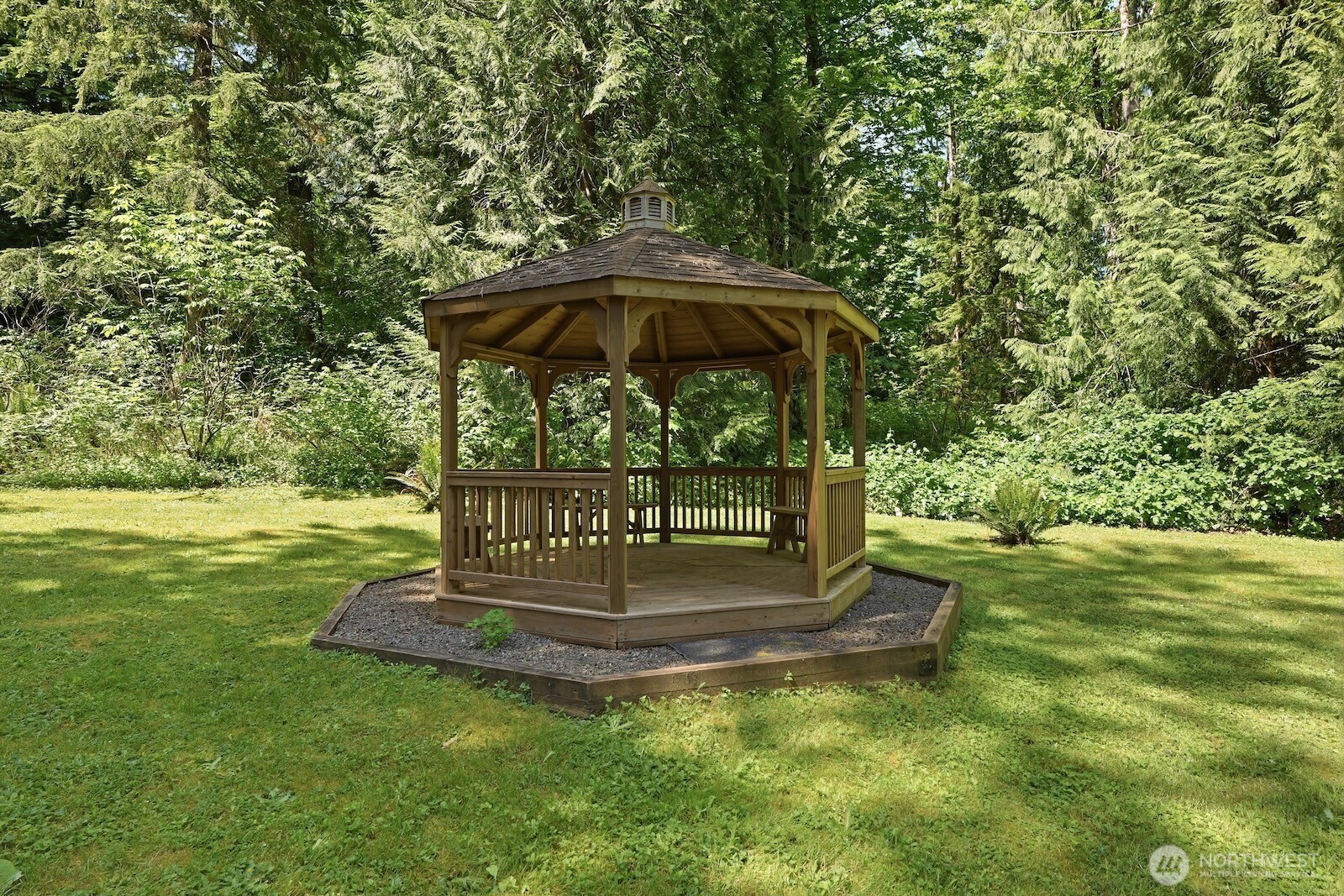 30130 Southeast Issaquah-Fall City Road Fall City, WA 98024 - Photo 31 of 39 a view of a table and chairs in the garden