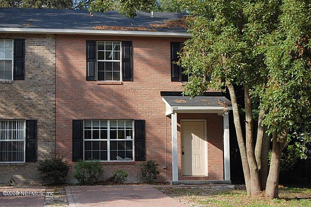 5209 Arlington Road Jacksonville, FL 32211 - Photo 1 of 1 a front view of a house with garden