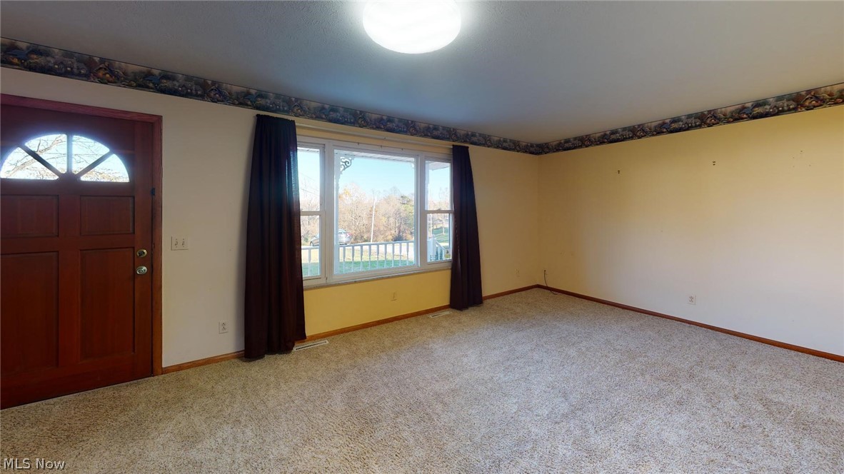 1420 Spider Ridge Road Parkersburg, WV 26104 - Photo 7 of 25 Large living room with lots of natural light