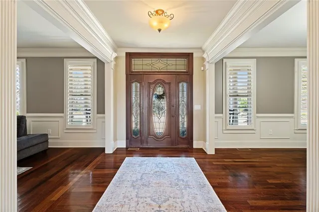 a living room with furniture a window and a fireplace