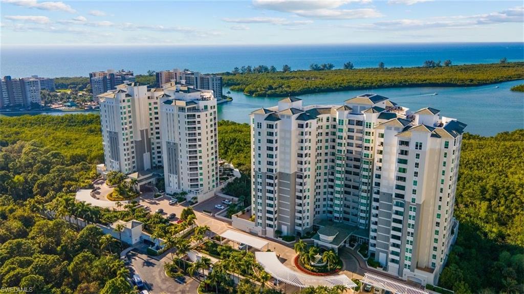 285 Grande Way, Unit 1501 Naples, FL 34110 - Photo 31 of 35 a view of a city with tall buildings