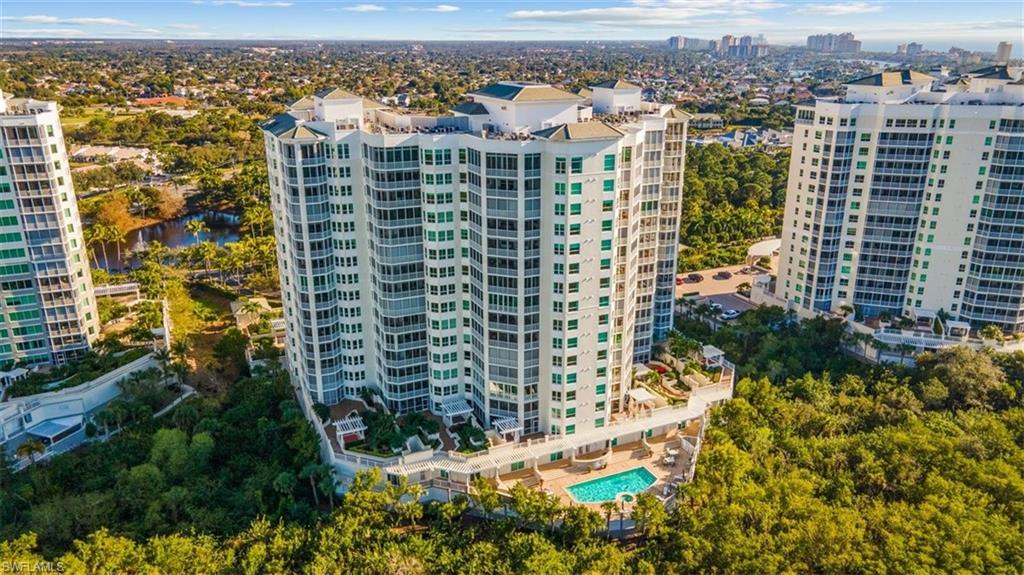 285 Grande Way, Unit 1501 Naples, FL 34110 - Photo 32 of 35 a view of a city with tall buildings