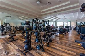 285 Grande Way, Unit 1501 Naples, FL 34110 - Photo 34 of 35 a view of a room with gym equipment