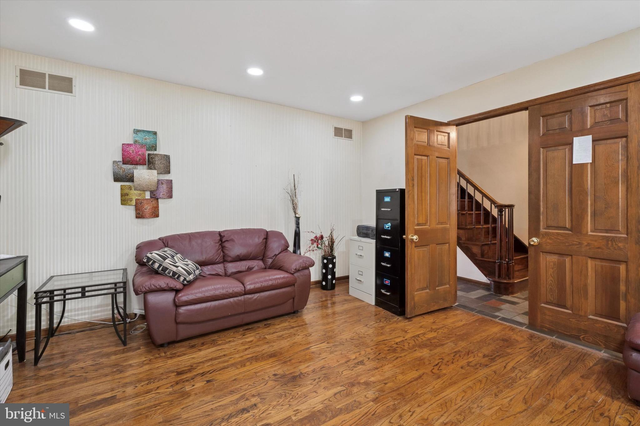 125 Red Lion Road Huntingdon Valley, PA 19006 - Photo 14 of 32 a living room with furniture and stairs