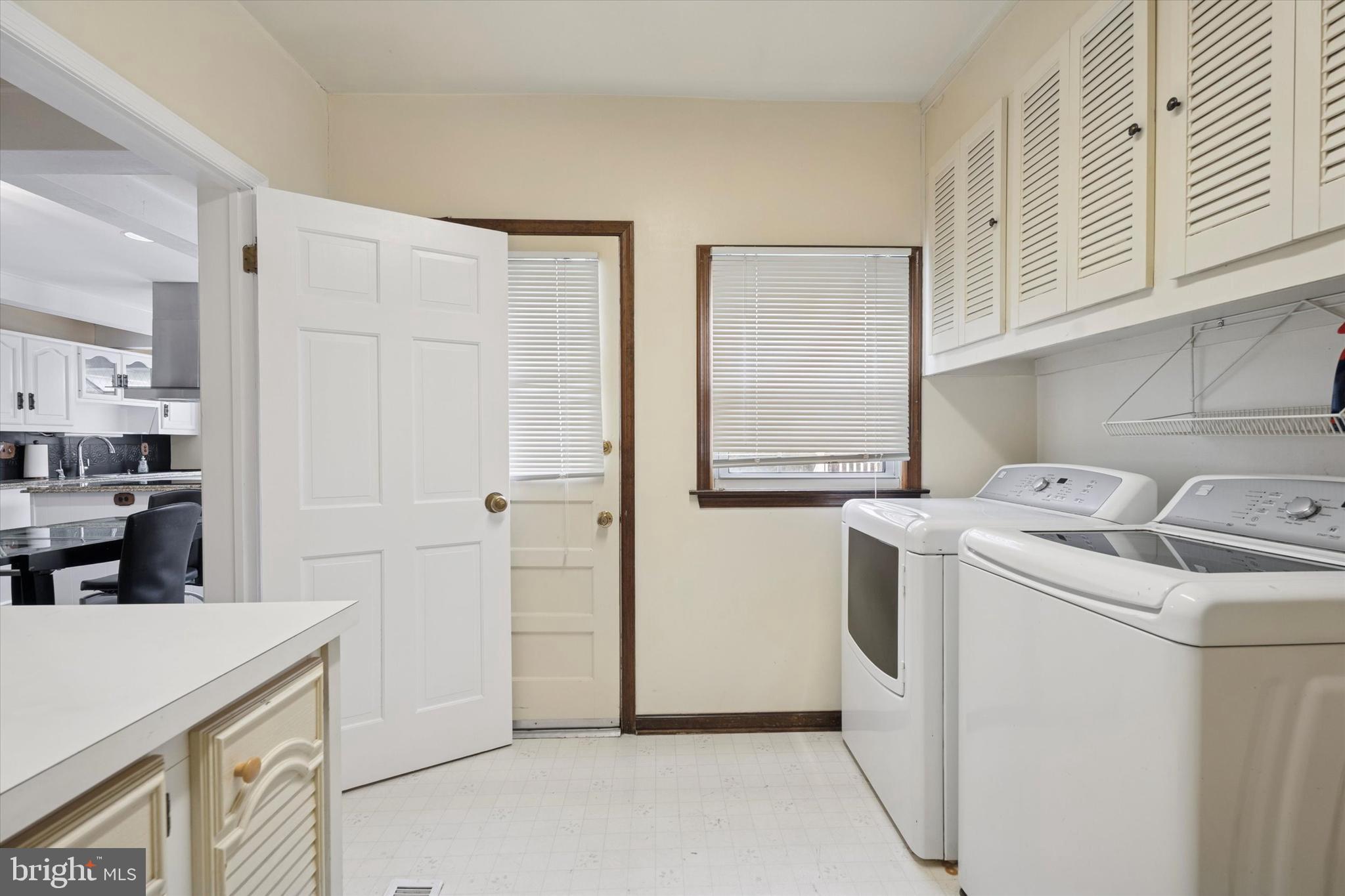 125 Red Lion Road Huntingdon Valley, PA 19006 - Photo 15 of 32 a view of storage and utility room with washer and dryer