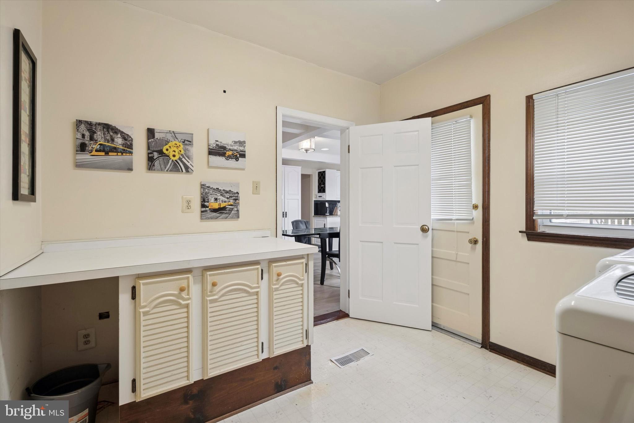 125 Red Lion Road Huntingdon Valley, PA 19006 - Photo 16 of 32 a view of a kitchen with cabinets and wooden floor