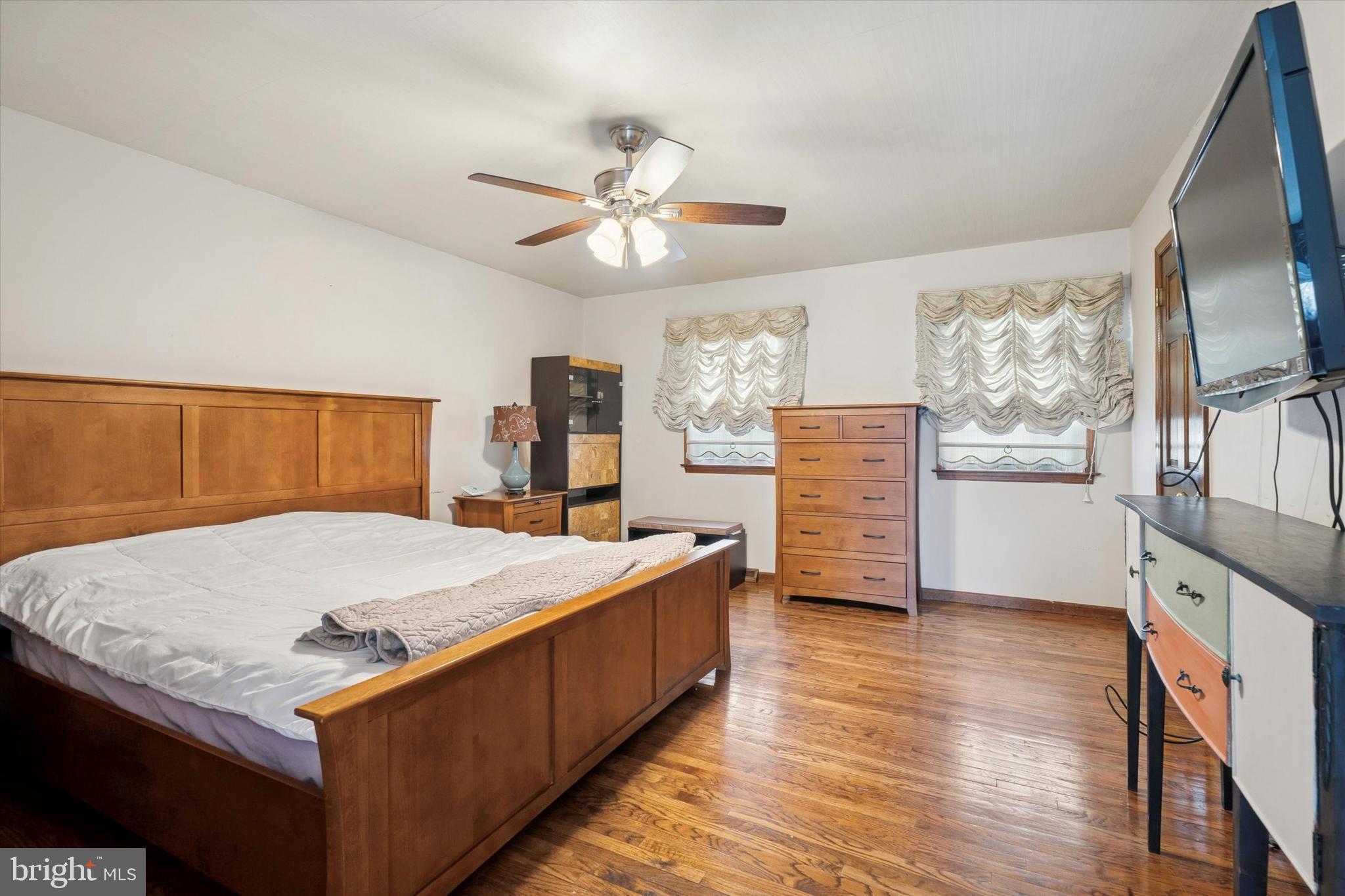 125 Red Lion Road Huntingdon Valley, PA 19006 - Photo 17 of 32 a living room with furniture and a flat screen tv
