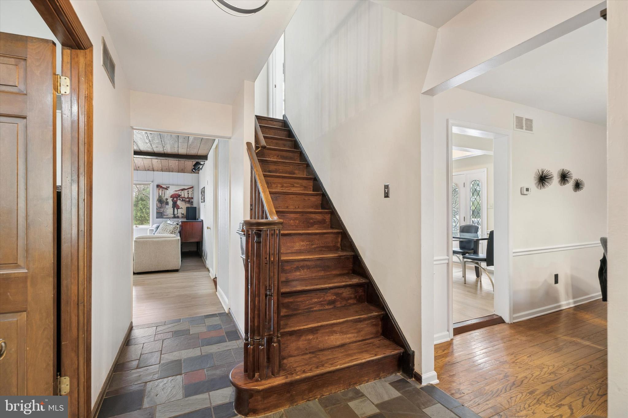 125 Red Lion Road Huntingdon Valley, PA 19006 - Photo 3 of 32 a view of a hallway view with staircase and kitchen view