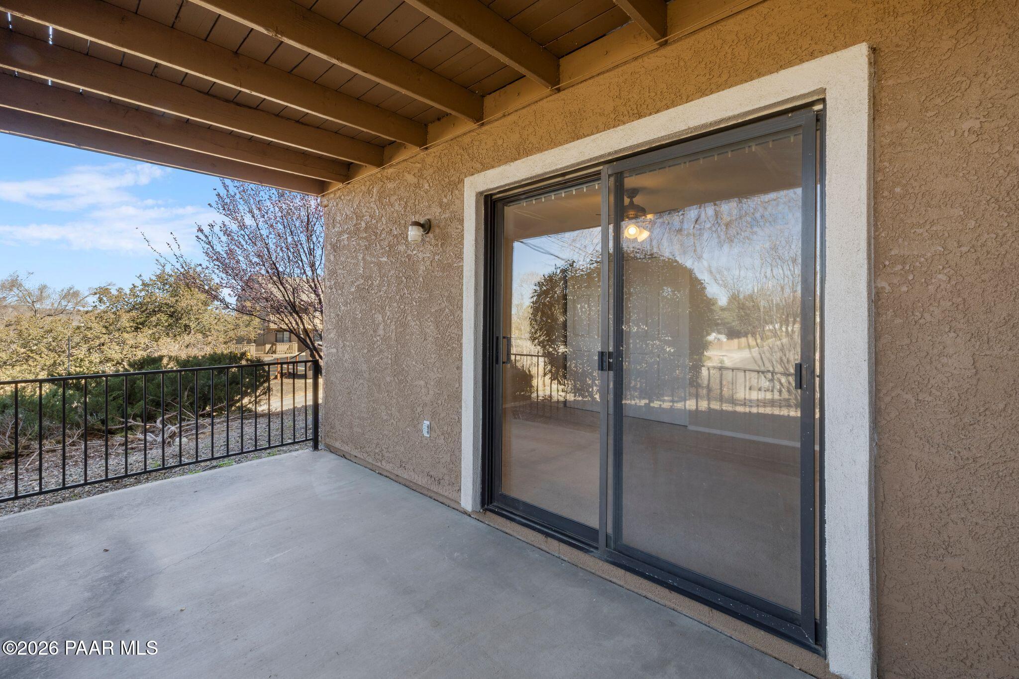1001 East Goodwin Street, Unit 101 Prescott, AZ 86303 - Photo 20 of 23 a view of a glass door and the balcony