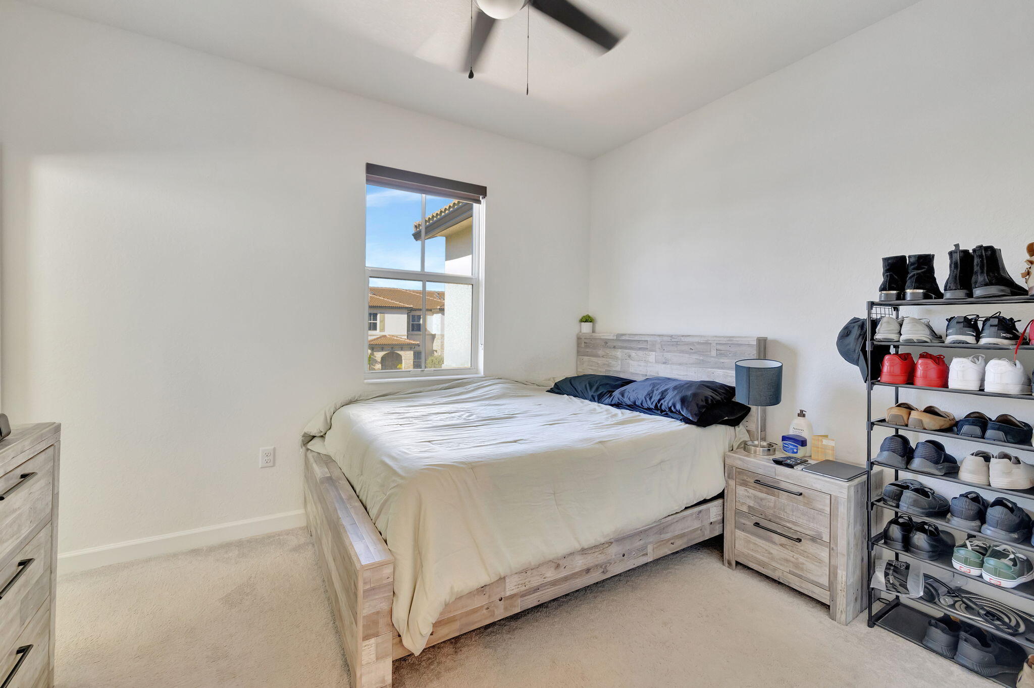 12227 Northwest 23rd Avenue Miami, FL 33167 - Photo 20 of 52 a bedroom with a bed and a tv