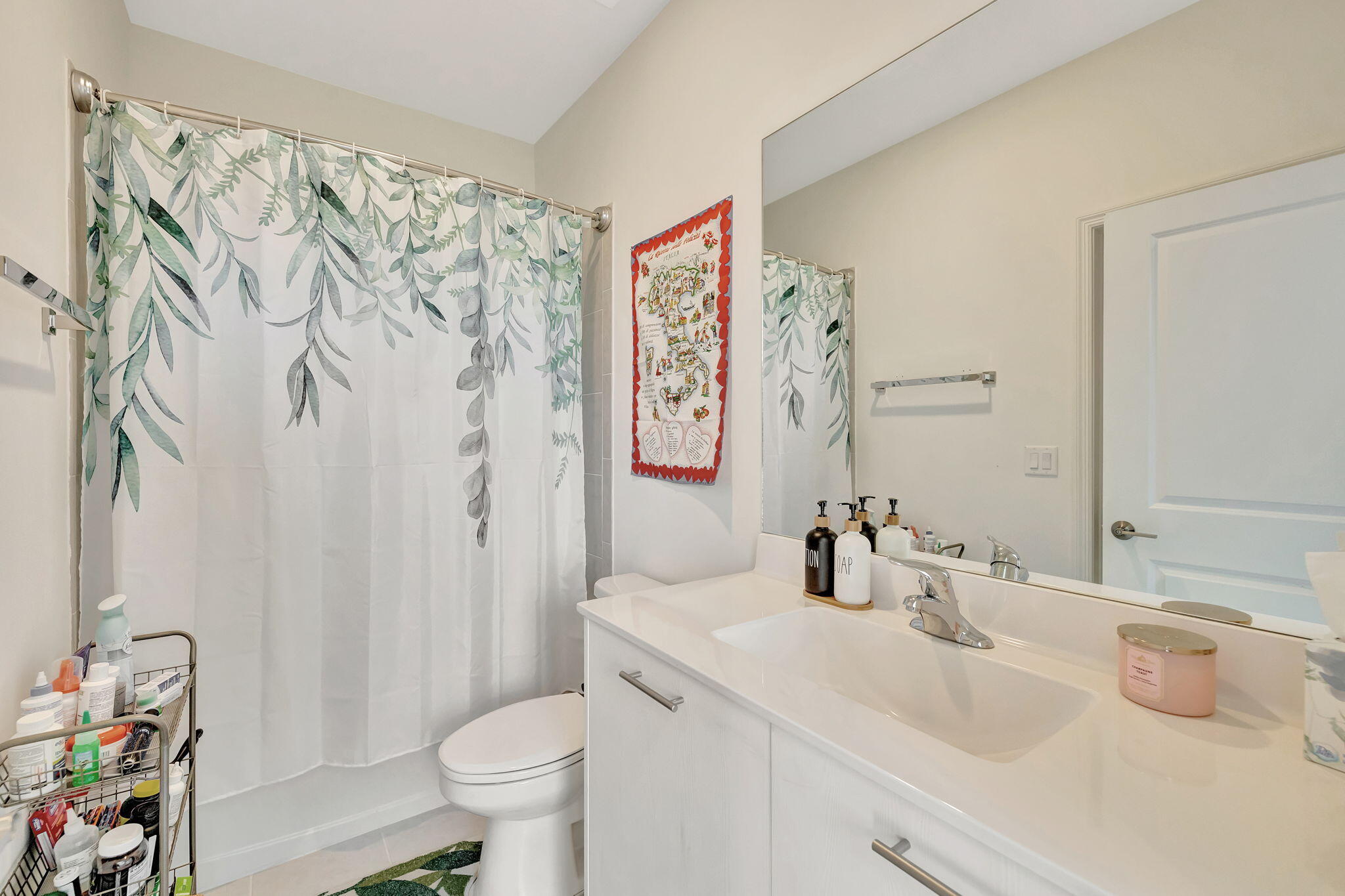 12227 Northwest 23rd Avenue Miami, FL 33167 - Photo 29 of 52 a bathroom with a sink toilet and shower