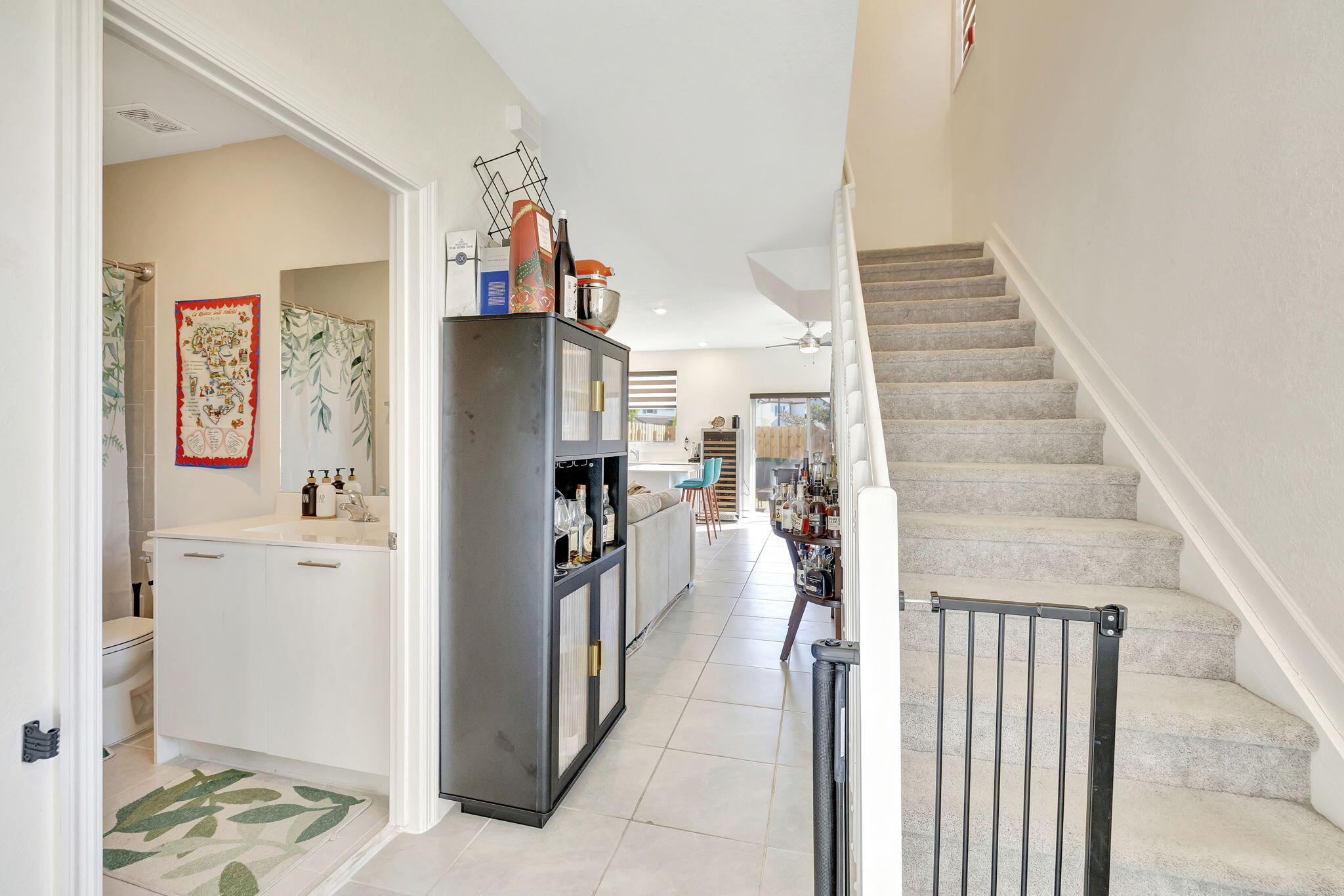 12227 Northwest 23rd Avenue Miami, FL 33167 - Photo 3 of 52 a view of a hallway with wooden floor and entryway