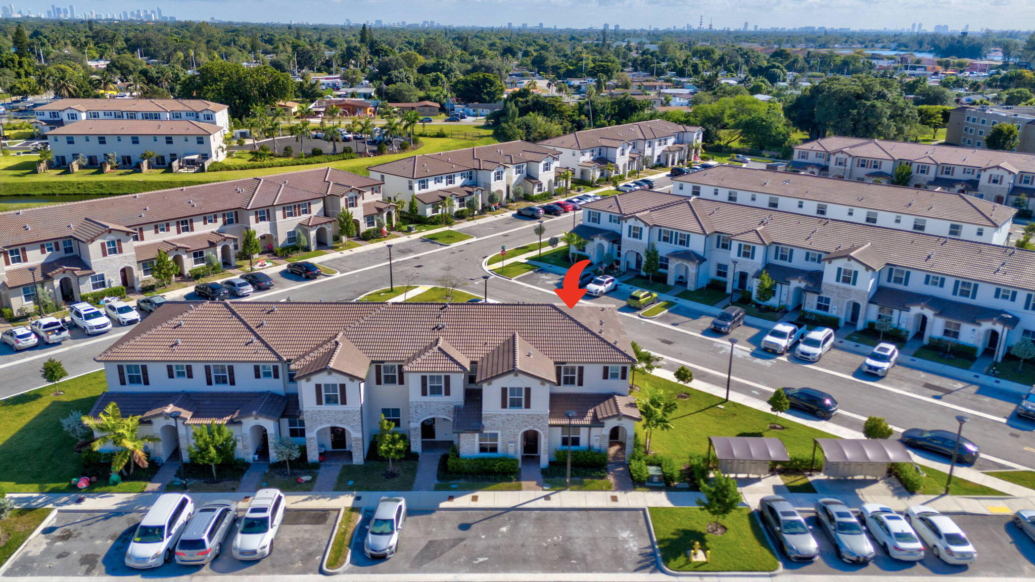 12227 Northwest 23rd Avenue Miami, FL 33167 - Photo 39 of 52 a view of multiple houses with a city street