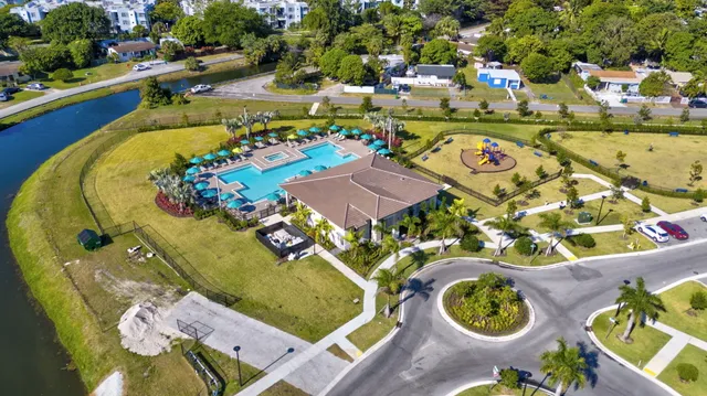 a view of swimming pool with outdoor seating