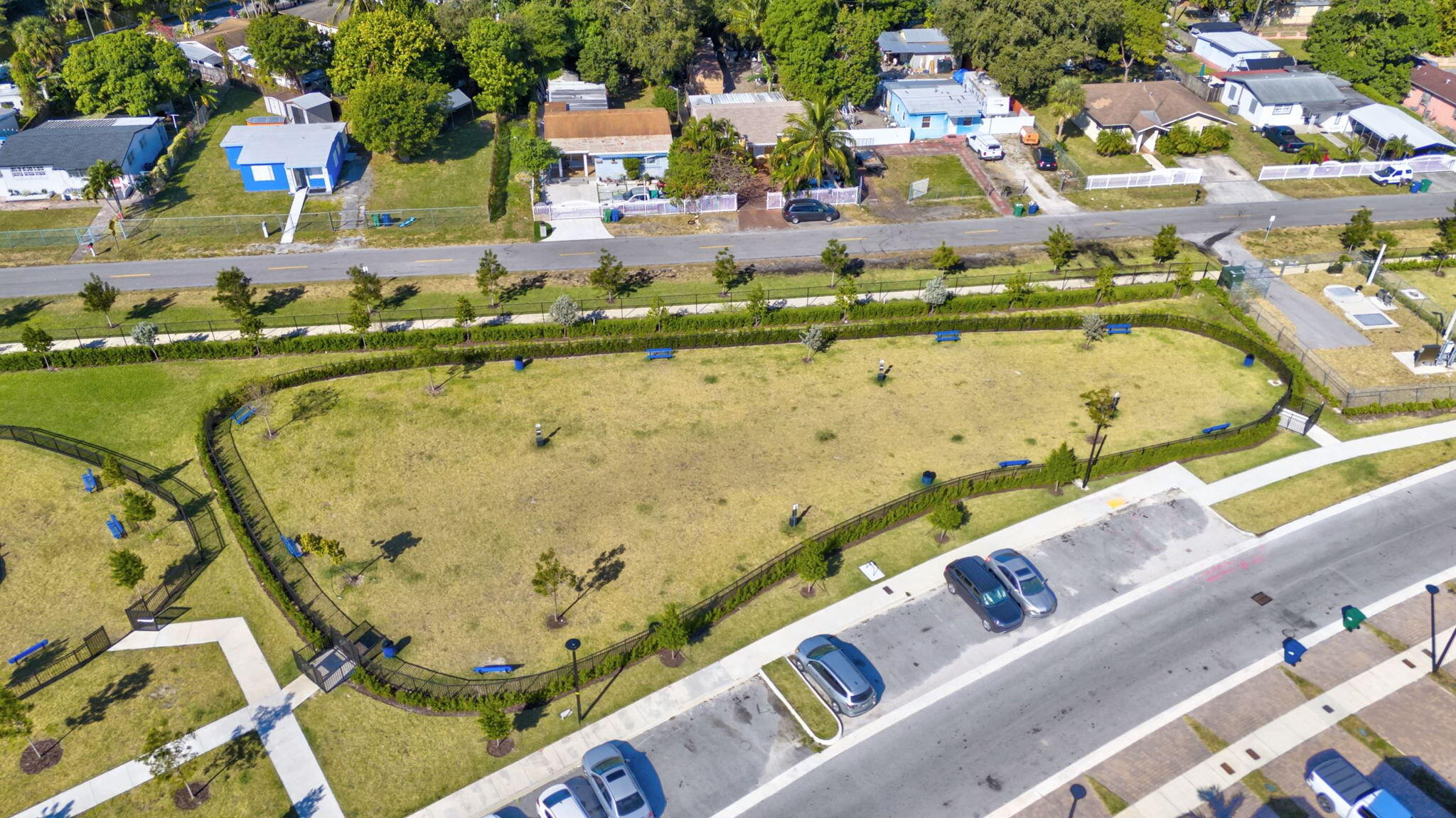 12227 Northwest 23rd Avenue Miami, FL 33167 - Photo 49 of 52 an aerial view of residential houses with outdoor space