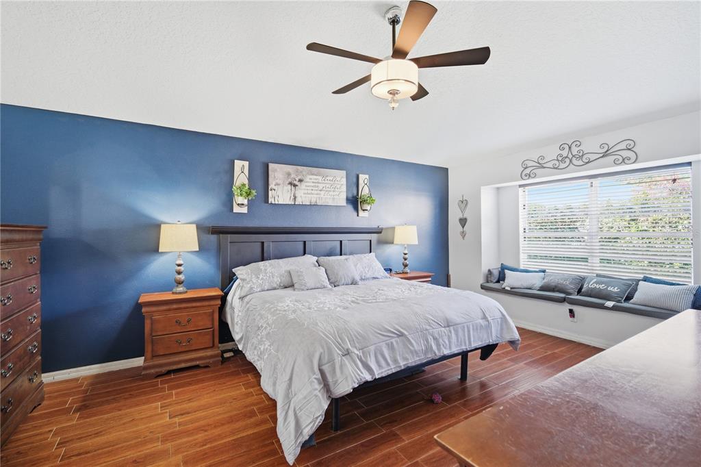 6325 Bridgecrest Drive Lithia, FL 33547 - Photo 46 of 72 a bedroom with a bed and a large window