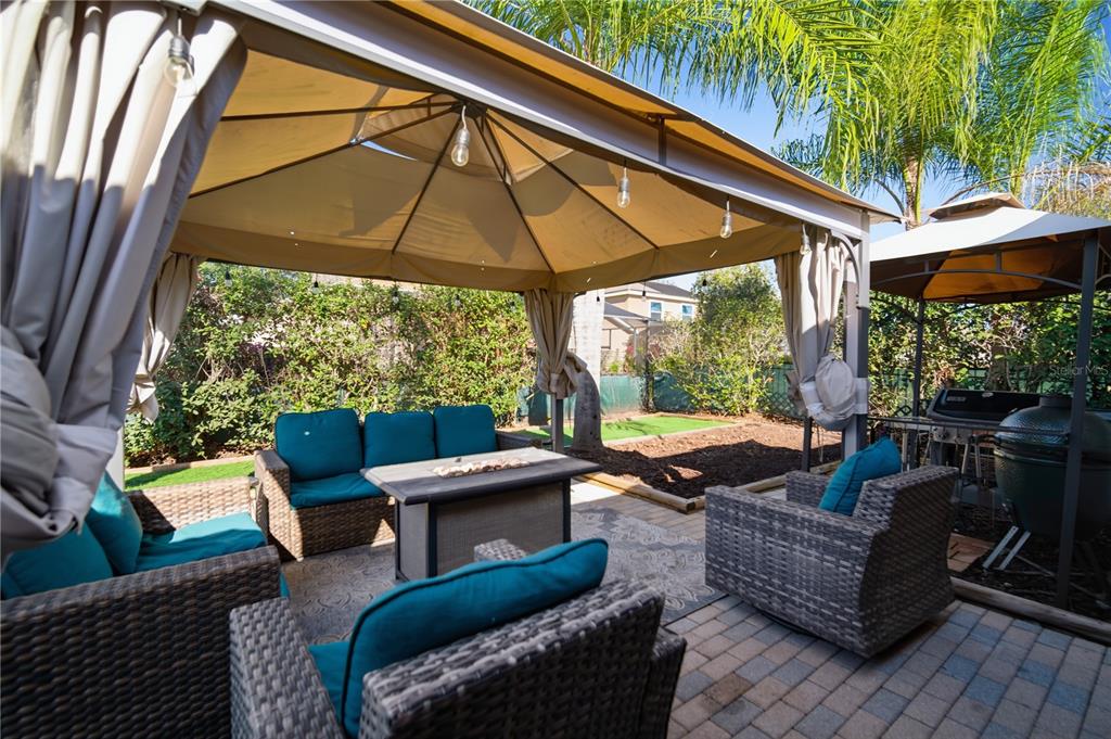 6325 Bridgecrest Drive Lithia, FL 33547 - Photo 56 of 72 a outdoor living space with patio furniture and a yard