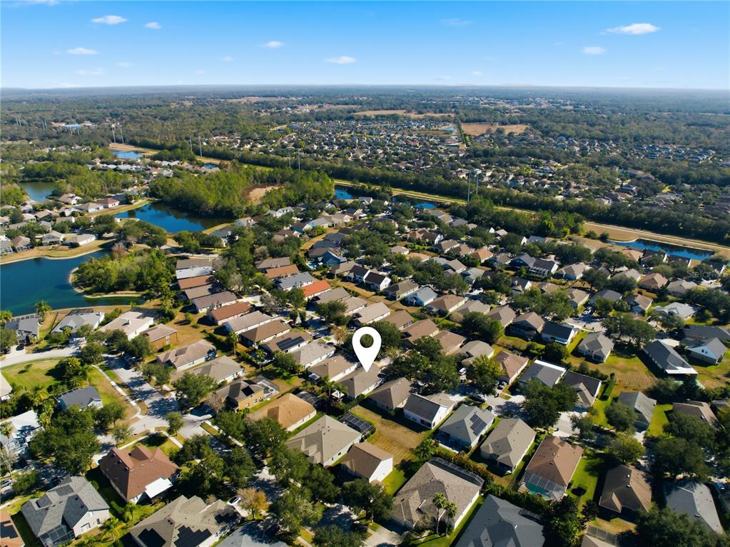 6325 Bridgecrest Drive Lithia, FL 33547 - Photo 71 of 72 an aerial view of a city with lots of residential buildings