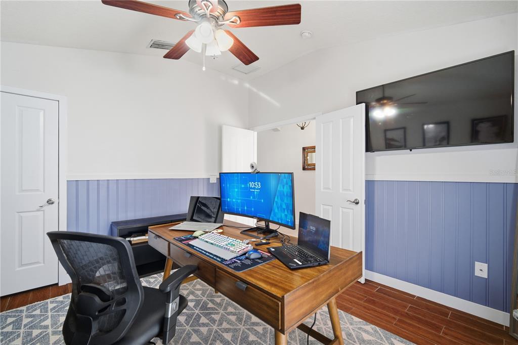6325 Bridgecrest Drive Lithia, FL 33547 - Photo 10 of 72 a living room with a couch and a dining table