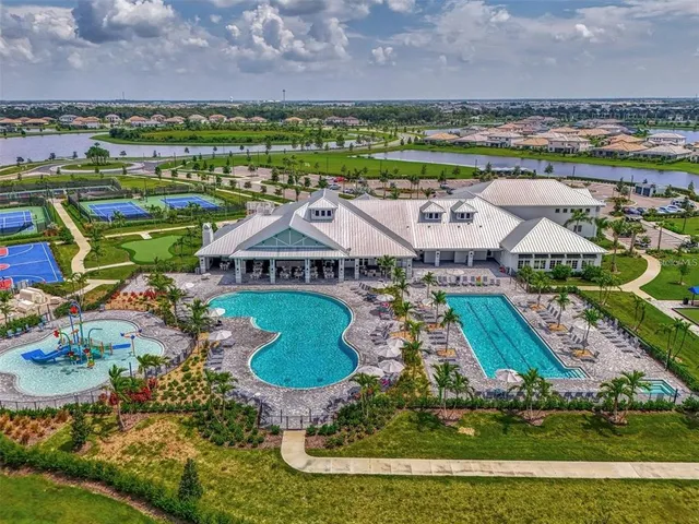 a view of a chairs and table in the patio