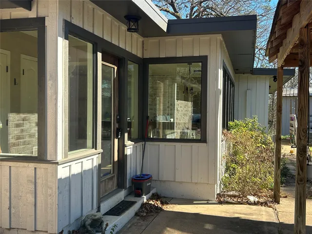 front view of a house with a window and door