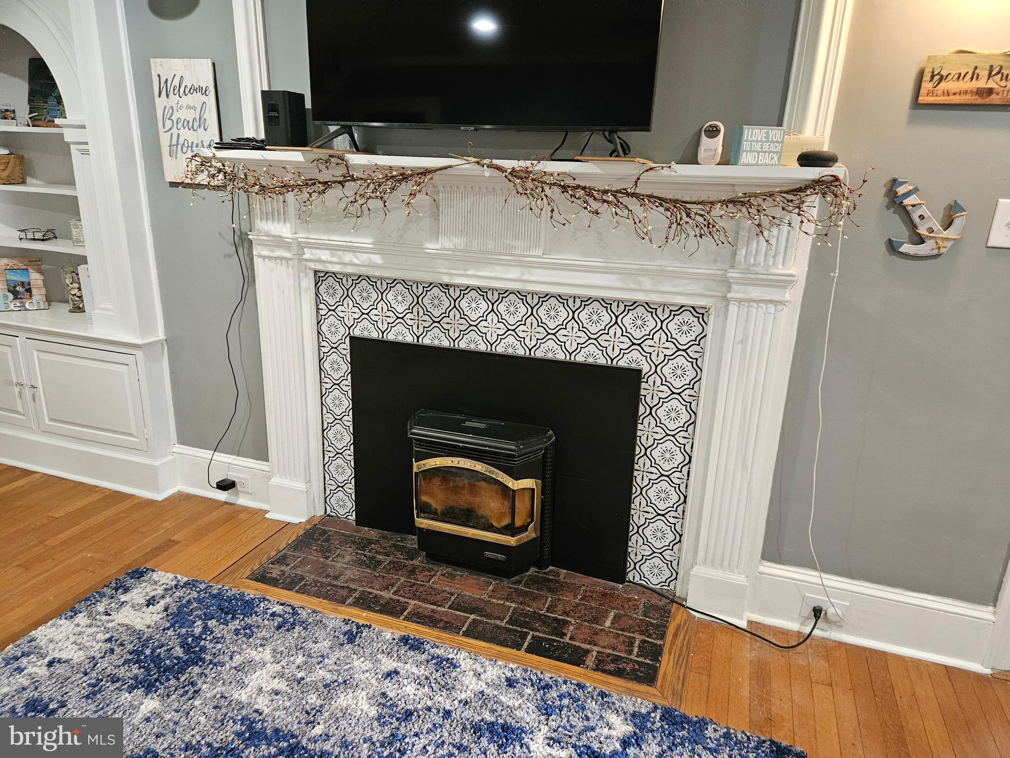 9177 Sharptown Road Laurel, DE 19956 - Photo 35 of 68 Living room with foreplace / pellet stove